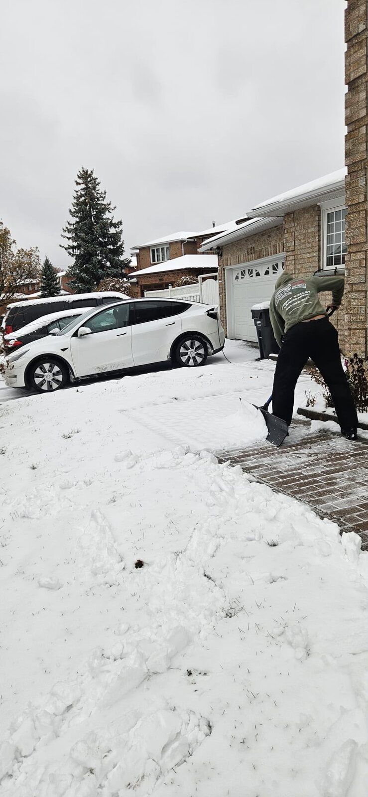 Credit Valley Landscaping crew clearing a residential property