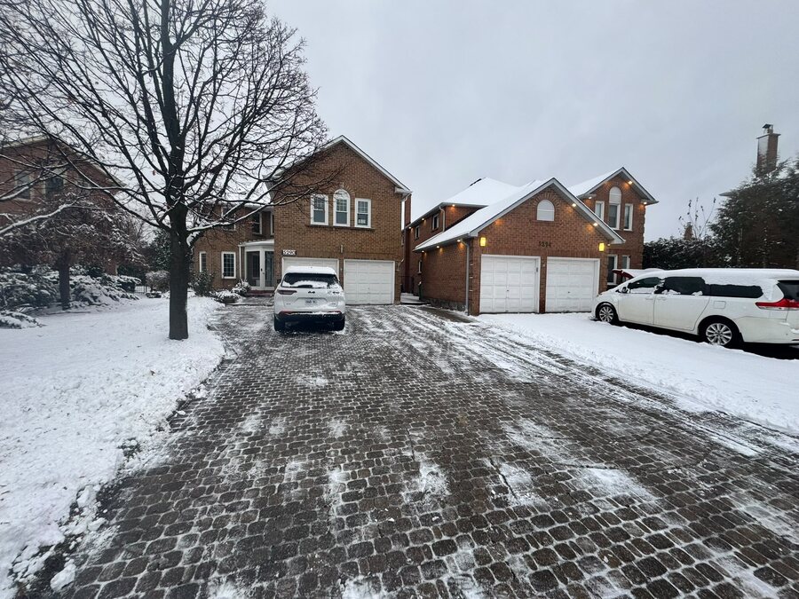 Cleared interlocking driveway after snow removal